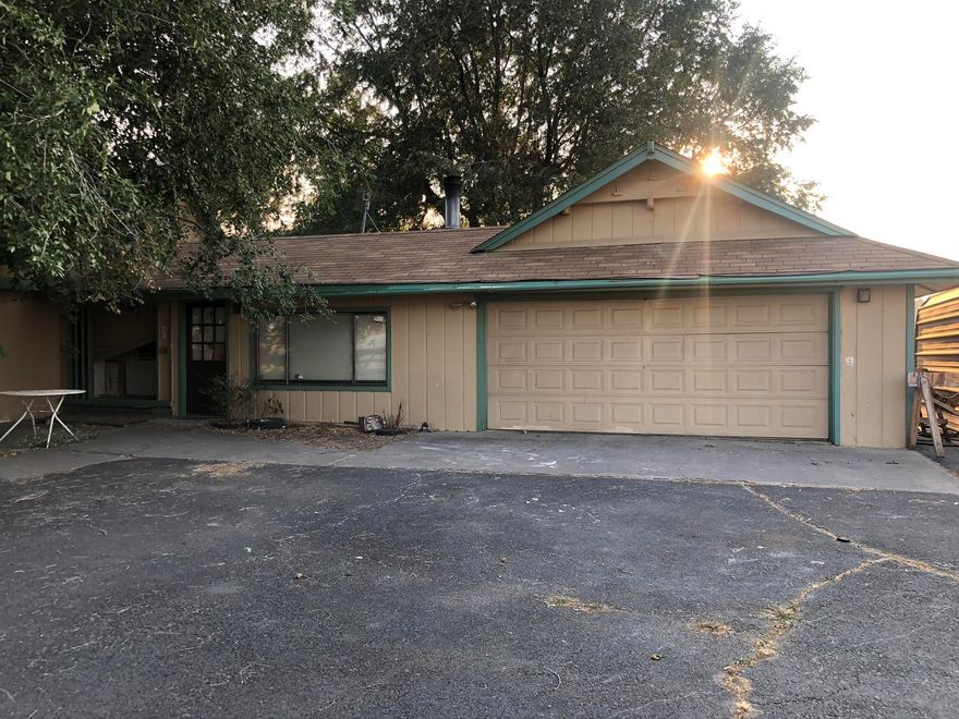 Fantastic opportunity to own small irrigated acreage between Redmond and Terrebonne! Just under 2.5 acres with 2 acres of COID irrigation. Fenced and
crossed fenced, 2 pastures, barn with concrete floors and power, and one stall. Potential set up for 2 additional bedrooms and bath upstairs in barn. Irrigation
pond with 3-4 year old pump, hand lines included. Home built in 1933 w/ addition added in 1970's. With some TLC it would make a great historic ranch house or
use the land to build your own custom home.