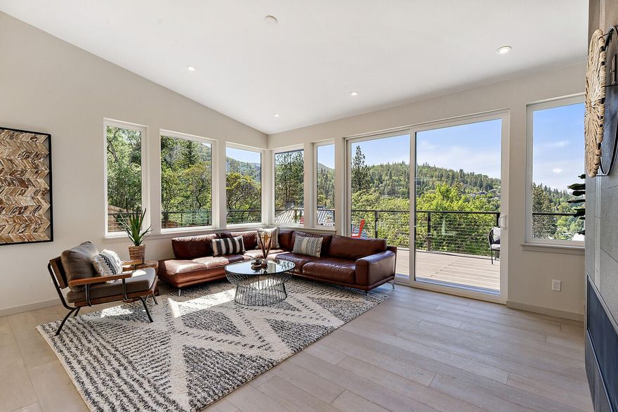 You won't find a better location than this new custom construction on gorgeous .31 acre in prime Ashland location; literally a stone's throw from theaters, fine dining and all that downtown Ashland has to offer. This 3009 SF contemporary home features fantastic views of Ashland, the East hills and views to the north. Incredible open floor plan with island kitchen, office, living space and laundry all on the same main level for an easy way of life. High quality finishes throughout highlight the walls of windows, spacious rooms, vaulted ceilings and feel of urban living in a private prime Ashland location. Spacious decking and patio bring the outdoors in for a larger canvas to enjoy. Large 2 car garage plus shop space and elevator make life easy from the moment you arrive.