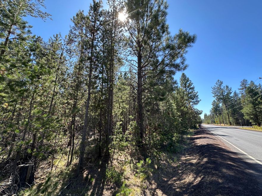 Wooded corner lot on paved street 1 mile from downtown La Pine, near the Little Deschutes River. Great spot for your dream home or vacation cabin.