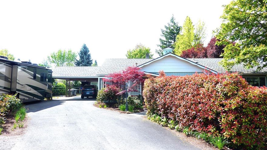 Spring into Summer with this fabulous home and SHOP on .32 acres in Lone Pine School District. Home features 3 BDR, 2 Bth, 1664 Sq. Ft., kitchen with large pantry , lots of cupboards and a breakfast bar, dining room with slider that opens to the patio, Lg family room with big windows to let in the sunlight, beamed ceilings, separate living room that you can close off with pocket doors , ceiling fan, Lg Master bedroom with bath, one bedroom has lots of storage, sliding drawers and a pull out ironing board, the other bedroom has bay windows, storage galore, covered patio to gaze out on the beautiful big back yard with mature landscaping, garden area, a double and single covered car port , 700 Sq. Ft. 2 car garage with workshop w/220 to complete all your projects, potting room, storage / hobby rooms, grape arbor, RV parking and room for all your Big Boyz Toyz. This home has it all. Call for your personal tour!