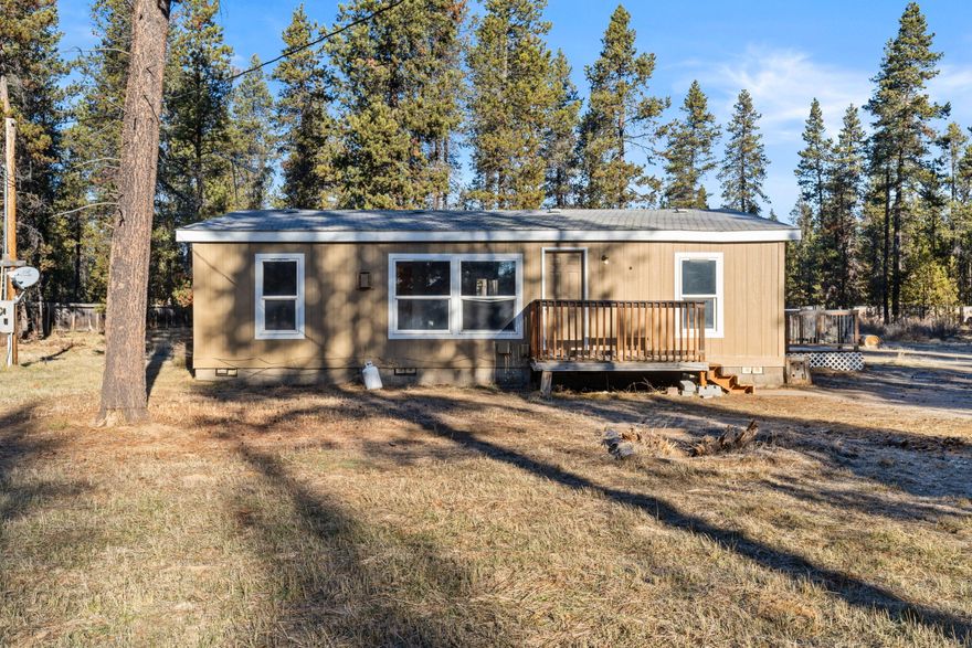 Welcome to this updated and spacious property just minutes from La Pine State Park and 15 minutes from Sunriver! With the home sitting on just over an acre, it's ready for all your wants and needs. Walking through the front door, the living room gives an open feeling and boasts natural light. The kitchen has updated appliances and new simulated wood throughout. The primary bedroom has a walk-in closet, updated carpet, and new vinyl flooring in the bathroom. There is great guest separation with the other two bedrooms on the other side of the living room. The property has a brand new well as of June 2023, a chicken coop, and is wired for an electric dog collar. Come check it out! Offering a $10,000 seller credit for closing costs or interest rate buy-down. Seller is offering a home warranty for the buyers valued at $555 with American Home Shield.