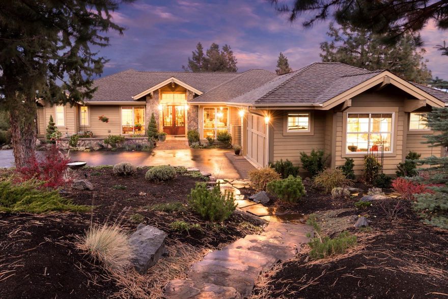 Fabulous Awbrey Village home with beautiful views of Mt. Jefferson, Black Butte and Smith Rock. This Single level living home includes well-designed guest quarters on the lower level. Designed by Neal Huston and a past Tour of Homes Award Winner this is a quality built home! The spacious great room with rock fireplace, has exotic Cumaro wood floors and abundant windows taking in the light and views. Enjoy the outdoors from every room & from the large deck in back or the lovely paver courtyard in the front The Gourmet kitchen has granite island an eating bar, breakfast nook & formal dining area. This home is great for entertaining!
So many possibilities for the 1200 sq ft Accessible guest quarters w kitchenette, 1 BR, large living space 2 baths and laundry. Has private entrance and private patio. Extra features installed to assist or care for accessible need person. This space could be perfect for a parent or in law, home office, man cave or to rent.
Lush landscaping create a gardener's paradise. Tremendous va