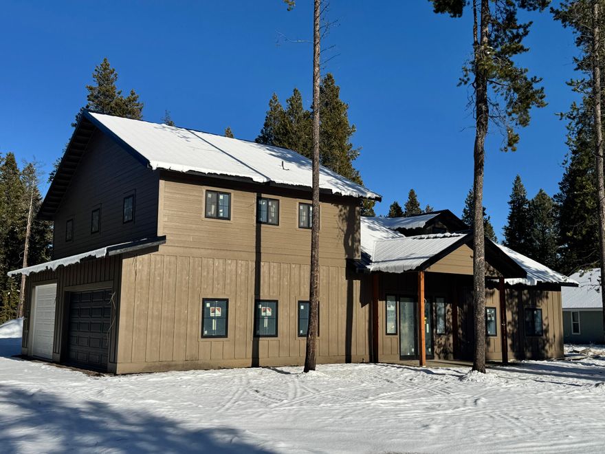 Located in the desirable Three Rivers area just south of Sunriver this new construction home offers flexibility space and access to the Central Oregon lifestyle with low HOA dues. The community provides Deschutes River access and multiple boat launches making it ideal for recreation and outdoor living.
The home offers 2411 square feet with three bedrooms three full baths and a dedicated office that can be marketed as a fourth bedroom. An upstairs lock off layout provides excellent potential for guest quarters multi generational living or a future rental opportunity.
Interior features include quartz countertops stainless steel appliances a gas range and gas fireplace along with LVP and carpet flooring. The exterior is finished with standing seam metal roofing and durable Hardie board and batten siding with lap siding on the gables and second floor.
A two car garage plus an oversized third bay accommodates taller vehicles Sprinter vans and outdoor gear. Built with a