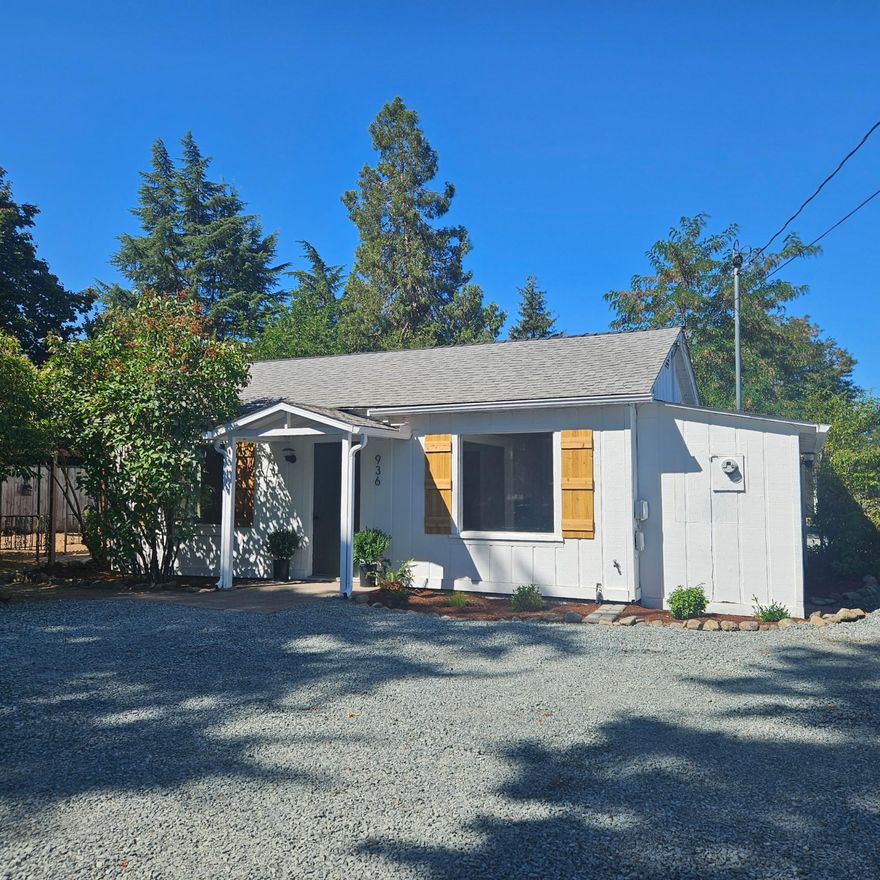 Welcome home to this cozy two-bedroom, one bath updated cottage located minutes from historic downtown Grants Pass, and just a short walk to the Reinhart Rivertrail walking loop, dog park & sport courts. 

Updated cabinetry, new flooring throughout. Upgraded lighting and plumbing fixtures with butcher block counters in the kitchen. Bathroom features custom tiled shower and flooring.
New Ductless heat pump system, detached two-car garage, and a private courtyard for relaxing or entertaining. Fresh landscaping and new gravel driveway. 
This extra large property is on 2 tax lots and has irrigation rights.