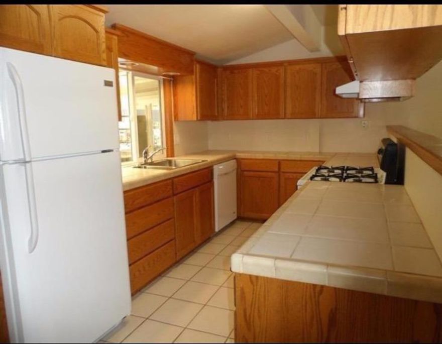 This is a unique property that can meet your special needs. This home has an attached 1 bedroom unit perfect for in-laws or snow birders'. Plenty of room to park that RV too. If you are searching for a true 2 family setup, this might be it. This home was completely remodeled in 2014 with 2 new kitchens, 2 new utility rooms, 2 new baths, new carpet, new furnace and hot water heater. The county shows a 2 bedroom unit with a family room and living room. Adjacent is a separate 1 bedroom unit. Plenty of room for the toys in the 800 sq. ft. shop. Room for that horse too in the fenced pasture. Irrigation rights and city water and sewer make this country property easy to maintain.