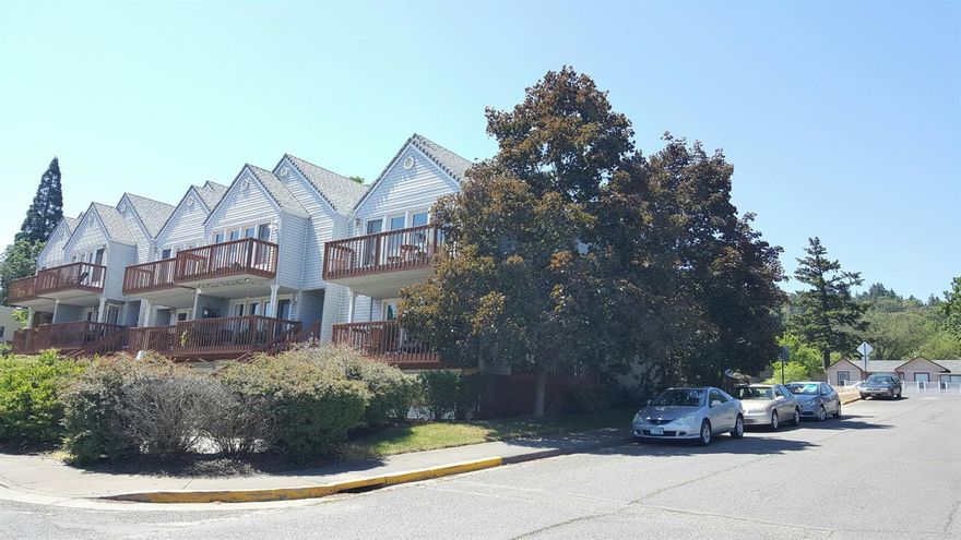 Well maintained Lori Lane townhome close to downtown with view of Grizzly. This light and bright end unit has been lovingly cared for and awaits it's new owner. Over 1800 sqft, vaulted master, upper and lower porches with views, patio in rear, pass through window from kitchen to dining room, large living area, main level laundry and large garage with workshop are some of the many features that make this a great place to live.