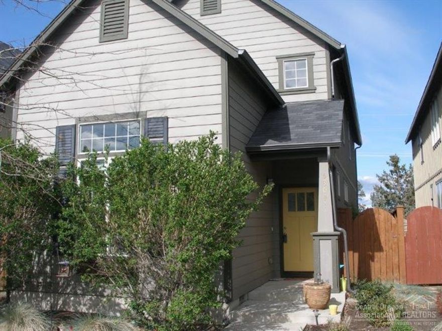 Woodhill build home features vaulted ceiling in the living room and master bedroom. 90% forced air gas furnace. Energy efficient home with solar panels on roof for extremely low electric bill. Tile entry, gas fireplace, stainless appliances, tile backsplash, deep kitchen sink. Mountain view from upstairs master.