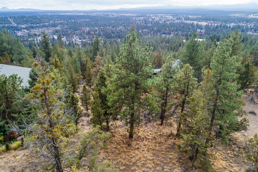 Incredible opportunity to build your dream home in the very desirable West Hills area! This .32 acre lot slopes upwards to allow stunning views of the Paulina's, Cascade Mountains and mountain terrain. Close to COCC, Newport Ave, Galveston and Northwest Crossing. Underground utilities available at street, city sewer available. Call for additional details!