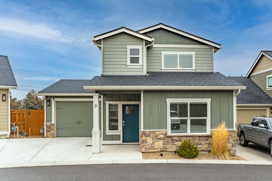 Welcome to The Links at The Greens! Low maintenance, easy living at its finest. This stand alone condo is well suited as a primary home, or your home away from home, situated in The Greens golf community in SW Redmond. The home offers a main level primary bedroom - complete with a walk in closet, tiled shower and solid surface tops. Also on the main level you'll find a powder room, laundry closet, dining area, living, and a spacious kitchen boasting functionality and style with quartz tops, full height backsplash, under-cabinet lighting, and stainless appliances. Upstairs has a  loft, second bedroom and full bathroom. Extended single car garage has enough room for a car and golf cart! The back patio and large side yard offer low maintenance landscape so you can spend your down time enjoying soothing sounds of the canal when in season. The community offers water, sewer, and garbage services in the dues, snow removal, common areas, landscaping, and walking trails. Welcome home!