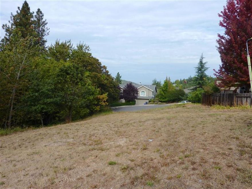 Lovely, private, cul-de-sac lot located in a preferred Ashland neighborhood. This is the perfect place to build your dream house and feel right at home. The lot has a moderate northwesterly slope with great solar exposure and is bordered by a wooded ravine with seasonal creek. Just a short way to all that Ashland has to offer such as renowned theatres, restaurants, shops and Ashland's own Lithia Park.