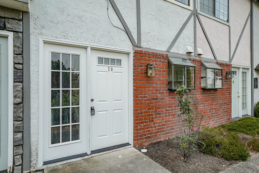 Don't miss this beautifully remodeled 2 bedroom 1.5 bath unit. Fresh paint, new engineered hardwood floors downstairs and new carpet upstairs. New kitchen appliances, sink, butcher-block countertops. New hardware throughout, new toilets, new blinds, ceiling fan added. AC unit in one upstairs bedroom. This property sits close to downtown Ashland and Lithia Park and has nice mountain views. Private back patio. Sweet common areas around the complex with mature landscaping. Relatively low HOA fees cover water, sewer, trash and common area maintenance. This unit has one carport and a storage closet.