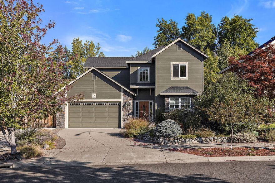 Beautiful home & yard backing up to Lazy Creek with private landscaping perfect for entertaining.  Lg custom pergola, professionally landscaped & low maintenance feels like an English garden. Lg cement RV parking on side of home.  Hardwood floors in the living room & family room that has French doors & gas fireplace. Stone floors in entry & kitchen that is open to eating area with a slider to the very private back yard with large deck, mature landscaping and patio area.    Kitchen w/lots of storage, granite counters, newer stainless steel appliances.  All bedrooms & laundry are upstairs. Master suite with stone floors, high ceilings, balcony over looking the backyard, duel sinks, stone walk in shower, water closet & jetted tub.  Updated HVAC system & reinforced rebar on fence in backyard.