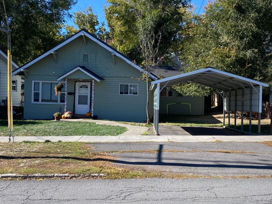 Super cute craftsman home with 11 FT ceilings,  in an ideal location, downtown Klamath Falls. 3 bedroom 2 bath with 1284 Sq. Ft. Lots of updates inside, including LVP flooring throughout, fresh paint inside and exterior. Crown molding and window seat in the dining room. Large kitchen with lots of cabinets, appliances included. Jack and Jill set up for the 2 bedrooms and main bedroom on the other end of the home with walk in shower. Nice laundry / mud room with access to the backyard with a deck for BBQS.  Carport, fenced backyard. EXTRA parking in the back of the home. This is a must see !