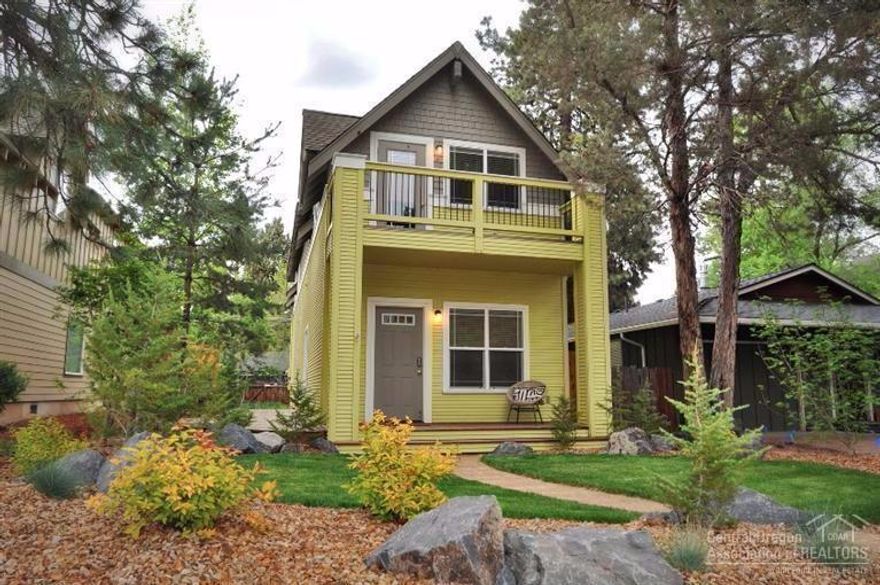 Adorable home in the heart of downtown Bend w/grandfathered vacation rental status! Main floor is all new: hardwood floors, paint, fixtures AND cabinets & marble tile counters in kitchen & powder bath. Second floor features new carpet & 2 spacious bedrooms w/loads of windows & light PLUS vaulted beamed ceilings! Each BR has its full bathroom. One BR is set up as a suite w/large attached bath, spacious closet AND outdoor balcony! New landscaping & privacy fence + oversized single car attached garage!