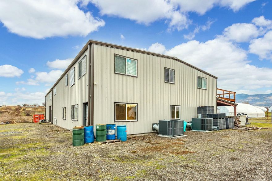 Southern Oregon mix light and indoor OLCC cannabis farm featuring a  3600 sq ft with 96 light indoor with 40 tons of ac, 2 506 quest dehus, and currently set up with living soil beds. A  5000 sq ft flex-space metal building with plans to add additional 50 light indoor cultivation flower room. Attached to this building is a 2000 sq ft lean-to for storage, ideal for equipment, tools, and staging. 4- 2880 sq ft mixed light auto-light deprivation greenhouses, each equipped with 75 lights, perfect for pulling 3 turns. 2 veg/mom greenhouse Additionally, and 4 solar-powered light deprivation greenhouses, which provide sustainable energy solutions and a controlled environment for optimal outdoor growth for 2 turns annually. Situated on six acres of land with Talent Irrigation District water rights and 500kva 208 3phase power, it's a versatile property with ample potential for expansion.