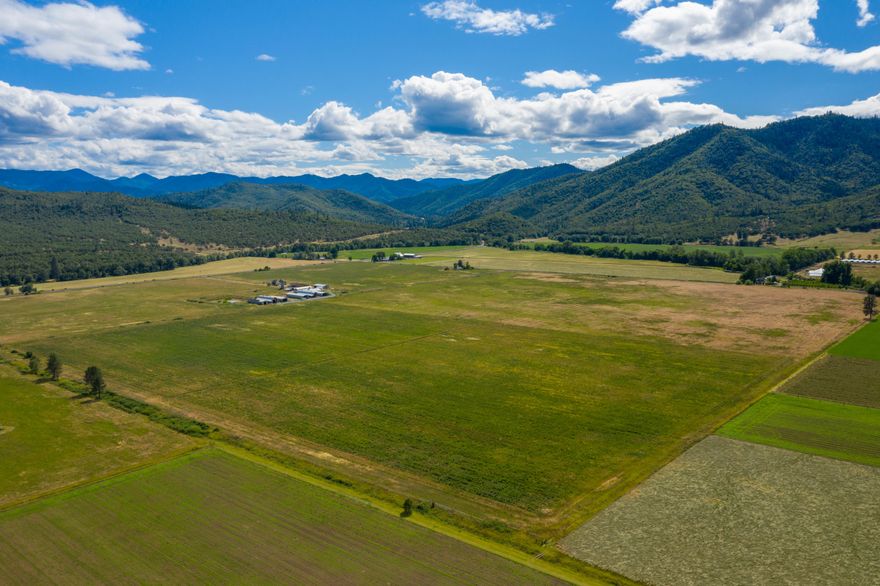Sams Valley ranch designated Prime Farmland. Comprised of 276 contiguous acres. Features Class I and Class II soils plus water rights to irrigate 160 acres. (3) dwellings and multiple auxiliary buildings. Excellent potential for a diversified ranching operation with farming and livestock plus housing for farm labor and ranch hands. Sams Valley is considered one of the best farming and ranching areas in the United States.