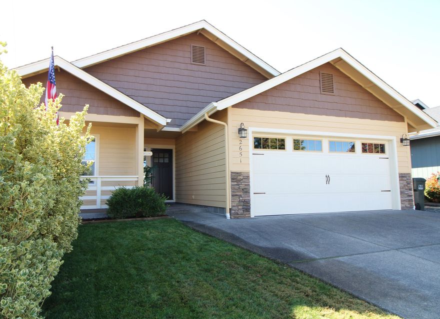 Pride and Ownership through and through! This perfect 3/2 home has been meticulously maintained from the inside out. It features beautiful wood floors, a completely renovated kitchen with stainless steel appliances and an amazing industrial island! A welcoming and open floor plan with vaulted ceilings and an abundance of natural light.  Not to mention; a freshly painted exterior, a picture perfect backyard with a covered patio, an indoor laundry room with ample storage, and a spacious two car garage with built-ins. Two guest bedrooms and a nice sized Master with a large bathroom and double vanity sink! Trust me when I say, this home SHINES! Located in a nice neighborhood with nearby new construction- close to the hospital and in school district 7. Call today for your own private tour, this lovely home won't last long!!