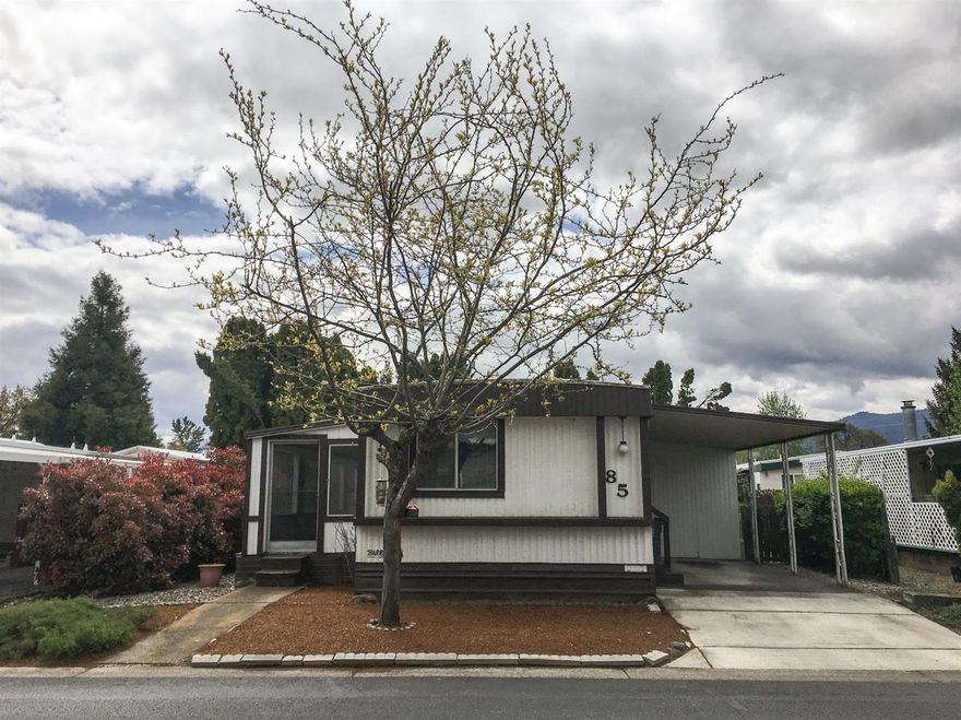 Diamond in the rough! Cozy 2 bedroom, 2 bath home located in Glenwood Mobile Home Park, a 55+ community. Large living area accompanied by a dining area. Kitchen has cabinet space and includes refrigerator, oven/range and dishwasher. Separate laundry area off the kitchen includes washer and dryer. Both bedrooms are roomy and mast bath includes separate shower and bathtub. Carpet and vinyl flooring throughout. Carport includes a nice sized shed for extra storage. Also includes large, enclosed sun porch with electrical for those breezy summer evenings. Clubhouse amenities include kitchen, library, pool table, exercise room, and heated pool. Priced to sell and move in ready.