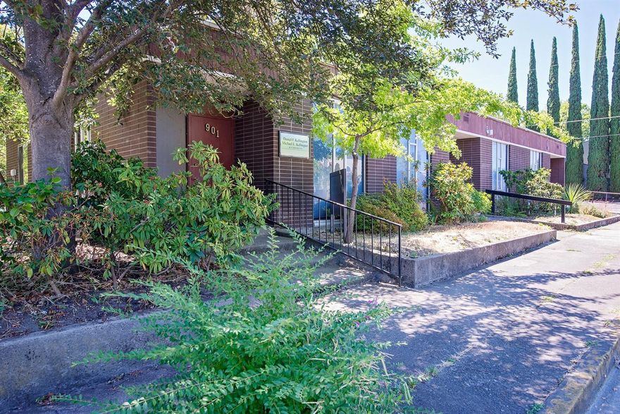 Awesome Brick Building with a slight Mid Century Modern Feel, and has plenty of off and on street parking. This commercial property is ideal for someone looking for an investment, or someone who wants to stop paying rent for their business and be the owner of their own office building. 3 separate units.