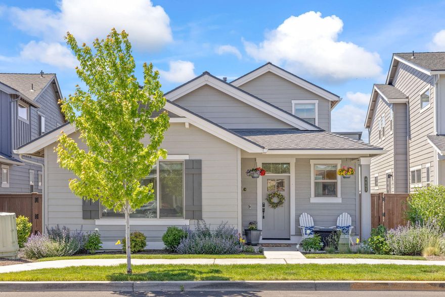 This charming 3-bedroom, 2.5-bath home offers 2,108 sq ft of comfortable living space in a peaceful neighborhood just a 10-minute drive to Bend. Enjoy a welcoming covered front porch and a spacious great room with a coffered ceiling and cozy gas fireplace. The primary suite on the main floor features a walk-in closet and dual sinks, providing a perfect retreat. Upstairs, you'll find a versatile loft area and a walk-in linen closet. Additional highlights include a 2-car garage with additional shop/workspace, community pool, scenic walking trails along the canal, and proximity to great schools—all in a quiet, family-friendly community.