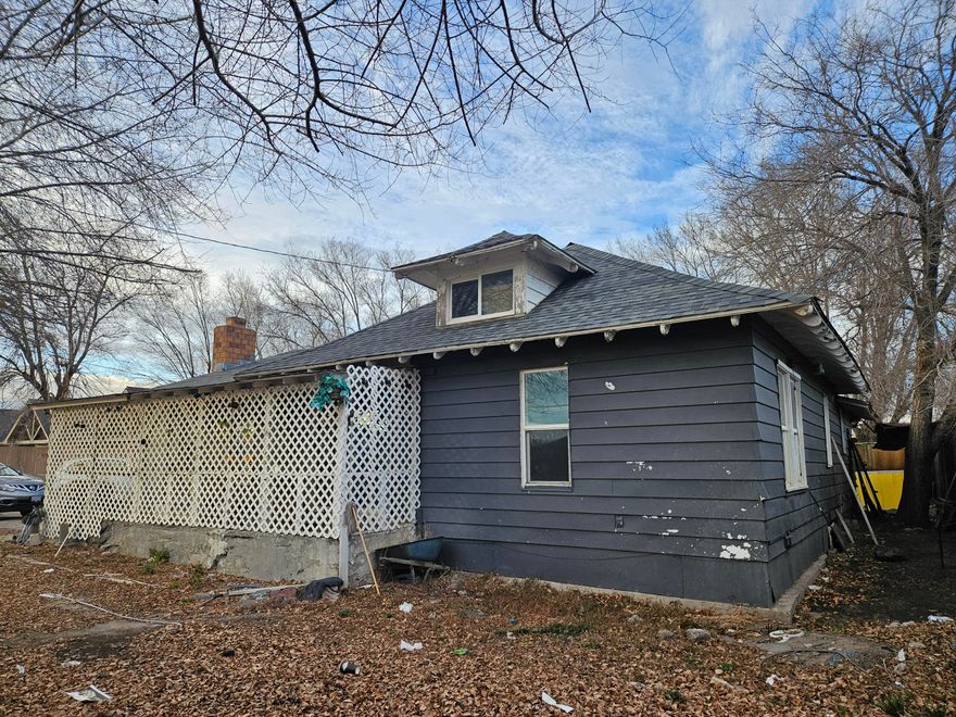 This home offers great potential with a little TLC! Featuring three bedrooms, a spacious dining room, and a welcoming living room with a fireplace. All of this sits on more than half an acre of level land in a desirable suburban location. A wonderful opportunity to create your ideal home!  There is a second shower in the laundry room.  Seller is offering $10,000 for roof repairs.