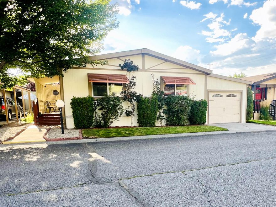 Welcome to easy living in the heart of Bend's desirable Suntree Village - a friendly, well-maintained 55+ community with convenience and privacy.  This turn-key beautifully maintained home offers a warm open-concept layout with updated features throughout.  Spacious living with vaulted ceiling.  Bright kitchen with skylight, ample cabinet space and open eating area. 
Primary suite with ensuite bath and walk-in closet. Updated TRANE HVAC system, vinyl windows, newer roof with rain gutters
Private fenced back yard with patio area - perfect for relaxing, entertaining or gardening. Covered and enclosed deep carport. Finished garage workshop area with 2 tool benches and flexible space. On-site management.  Monthly rent space includes-water, sewer, garbage, sprinkler maintenance, clubhouse and snow plow. 
Close to shopping, dining, senior center, Larkspur community center, walking trail and highway access. Owner occupied only, no sublease. All occupants must have park approval