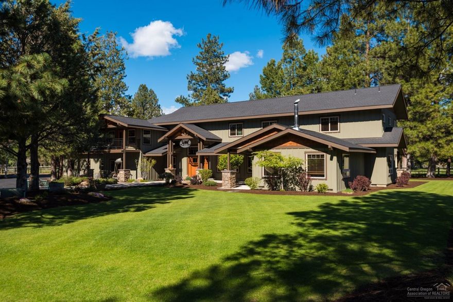 Three Brothers Ranch in Sisters, Oregon - Total of 5 bedrooms, 6 baths & 5,567 total sq.ft. on 2.21 acres with guest quarters & 40' x 60' shop on horse property! Main 3,887 sq.ft. house has great room with vaulted ceilings anchored by a custom suspended staircase. Ideal for entertaining! Gourmet Kitchen has two breakfast bars + island. Private master suite with balcony. Game room with fireplace, main-level guest suite, office space & large utility area. 3-car attached garage with 9.5' tall doors. Guest House is 1,680 sq.ft. with 2.5 baths and upstairs bonus area. 40' x 60' RV garage & Shop with exercise room & storage loft & two 12' x 14' tall pull-in doors. Covered Horse area & Conex container for hay. Landscaped grounds with irrigation system is fenced on three sides with dog run & fenced pasture. Ride out to Deschutes National Forest trails. Included: John Deere mower, pool table & custom welded swivel with Flat screen TV. A mere mile to downtown Sisters, shops & restaurants!