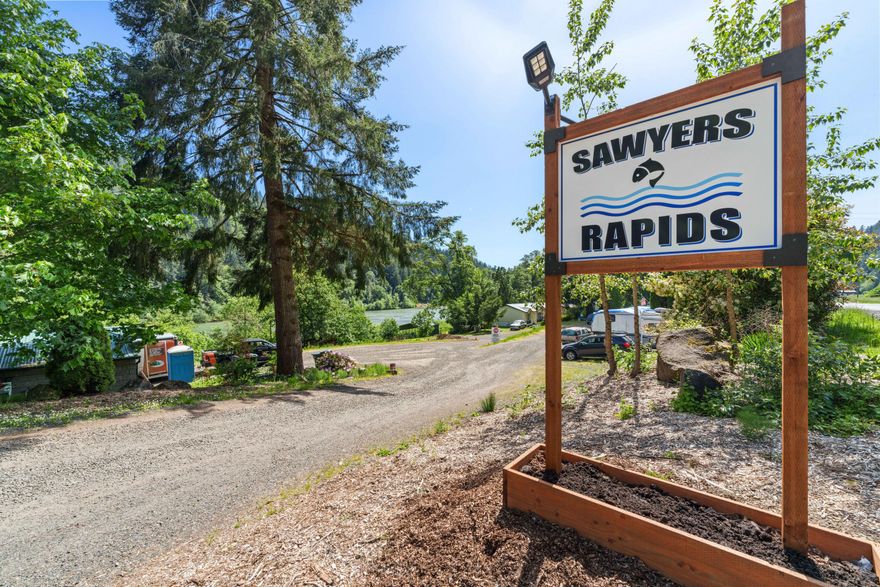 Sawyer Rapids RV Park is a rare riverfront RV and manufactured home community situated on approximately 8.5 acres directly on a highly regarded stretch of the Umpqua River. The property is widely known among outdoor enthusiasts for exceptional fishing, scenic beauty, and a relaxed riverfront setting that draws repeat visitors year after year. The park offers a diverse mix of RV sites, manufactured home spaces, short-term cabin rentals, and seasonal campsites, supplemented by multiple on-site revenue streams within a true destination retreat for extended stays and short-term getaways. Guests enjoy direct river access, a peaceful setting, and proximity to the Umpqua Valley and Oregon Coast recreation corridor. Park-wide fiber optic internet installed in 2024 enhances appeal. The offering reflects an estimated in-place 2025 NOI of $126,600, representing an implied capitalization rate of approximately 8.1 percent. Seller financing potential.