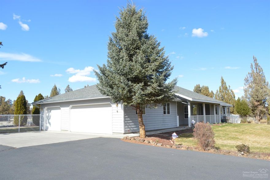 This is your opportunity to own a fantastic single level home with a huge shop on 5 peaceful acres just west of Redmond in beautiful Central Oregon. Take the enjoyable drive to either Bend or Sisters, quickly access the Deschutes River Canyon, or make your way to any of the several top golf courses Central Oregon is proud to offer with ease from this private setting. Single level homes with this much covered parking and storage are rare and should be given serious consideration.