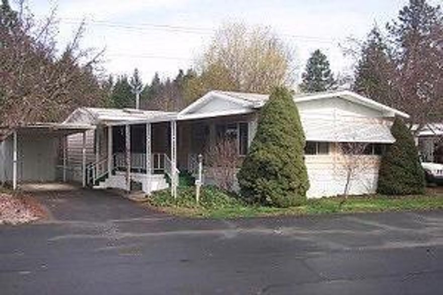 Must have a BCD lic. to list or sell. Mobile Home only for sale. No land. 55+ senior park in Cave Junction. Approx. 1638 Sq. feet with enclosed extra room that was used as office. 2 bdrms / 2 baths and family room. Newer wood floors in part of home and carpeting in the rest. There is a heat pump, wood stove and fireplace. What more could you want for the money!!! Come see this home today.