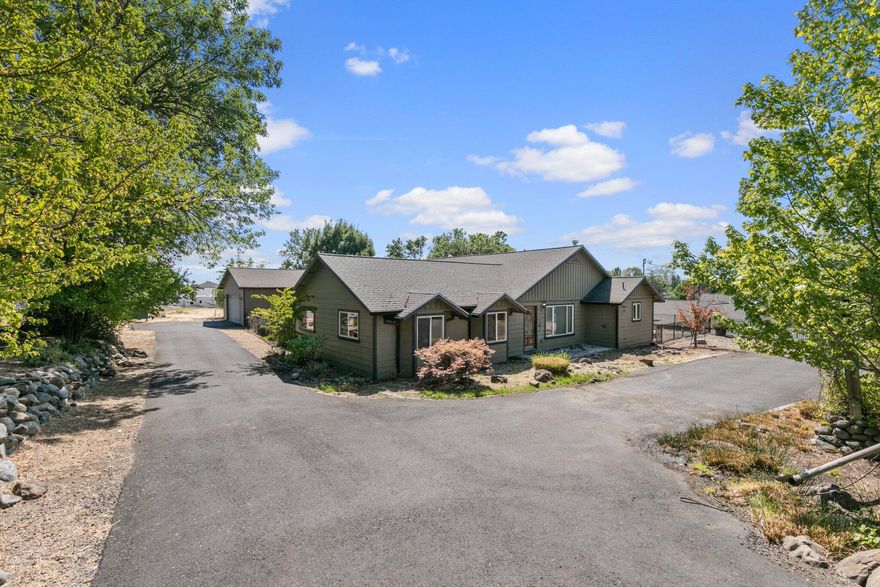 City already re-zoned this home for multi-family development!  Just on the outskirts of East Medford, this home is ready to live in with some new carpet and paint.  Already hooked up to City Sewer and City Water.  
This is your chance to subdivide and build 6-12 more units on this .95 acre lot. (per city). 

Sell off or live in the very comfortable home with 3 beds and office, 2 bathrooms, hardwood flooring and tile, a huge kitchen, an inground heated pool, and an oversized detached shop that will fit 4 cars.  Irrigation is also included – this home has it all. Don't miss out – call today!