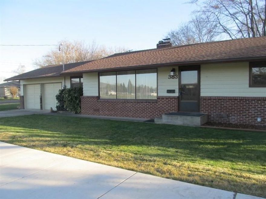 Affordable Southwest Medford home is now available! Built in 1956, this solid home has 1688 square feet and offers 3 bedrooms, 2 baths plus an office. The large living room features new carpet (hardwood floors underneath) wood burning fireplace and picture window that takes advantage of the views of the beautiful park across the street and the surrounding mountains. The kitchen has a breakfast nook, includes all appliances plus a wood burning brick indoor BBQ/pizza oven. The bedrooms have hardwood floors and the extra large master includes an oversized walk-in closet. Other features include indoor laundry with abundant storage, finished/insulated two car garage, new roof with transferable warranty, newer water heater, heat pump, upgraded electrical service and there is room to add RV parking. Located near schools, golf course, tennis courts and children's water park... Welcome Home!