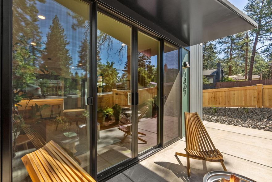 Up to $15k Lender Credit Available! Live in the single family, rent the ADU. This unique and award-winning floorplan offers 1200 combined square feet of living space. The elevated design pairs with intentional living in the heart of Midtown. With 14' vaulted ceilings and expansive windows, natural light pours into an open layout that feels spacious, uncluttered, and perfectly calibrated. A private outdoor patio extends the living space. The attached ADU features its own entrance and parking adds flexibility, whether for guests, rental income, or multi-generational living. Built for a true 'lock & leave' lifestyle, this home pairs low-maintenance with high-performance, includes an EV-ready garage, and is net-zero ready. Close to parks, trails, and Midtown's favorite spots.