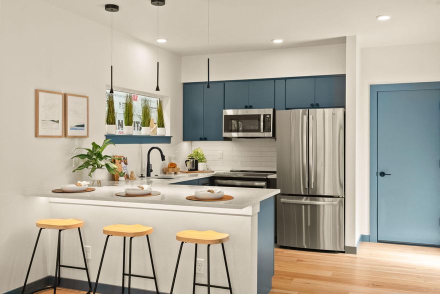 Up to $15k Lender Credit Available! Live in the single family, rent the ADU. This unique and award-winning floorplan offers 1200 combined square feet of living space. The elevated design pairs with intentional living in the heart of Midtown. With 14' vaulted ceilings and expansive windows, natural light pours into an open layout that feels spacious, uncluttered, and perfectly calibrated. A private outdoor patio extends the living space. The attached ADU features its own entrance and parking adds flexibility, whether for guests, rental income, or multi-generational living. Built for a true 'lock & leave' lifestyle, this home pairs low-maintenance with high-performance, includes an EV-ready garage, and is net-zero ready. Close to parks, trails, and Midtown's favorite spots.