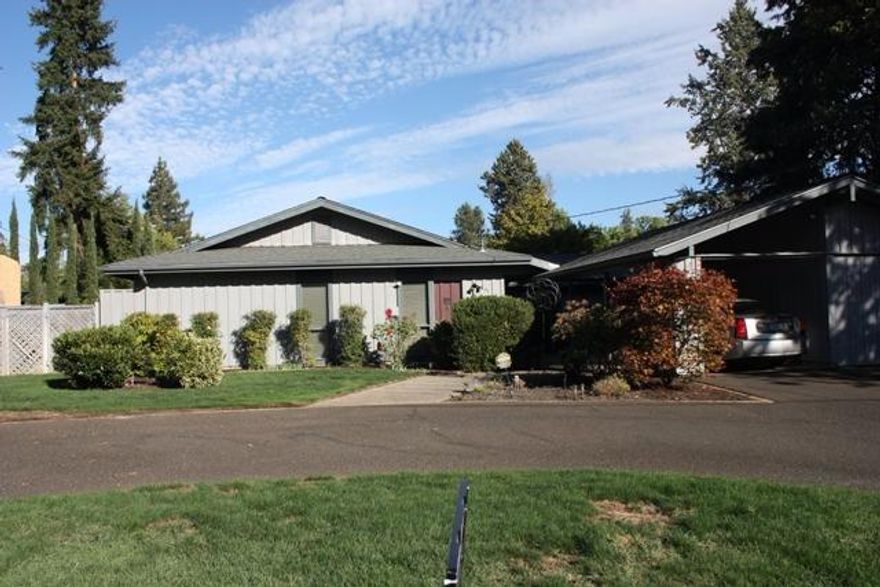 Old East Medford prime location. Large lot with in-ground gunite pool. Over 2,250 sq. ft. with 5 bedrooms and two baths. Beautiful court yard leading to studio or shop. Vaulted ceilings, newer heat and air, newer hot water heater, and newer roof. Tons of potential for this home. Park next door has tennis, pickle ball, and basketball courts. Close to RVMC,RVCC, schools, and multiple parks. Circular drive way with plenty of room for toys. Multiple storage sheds.