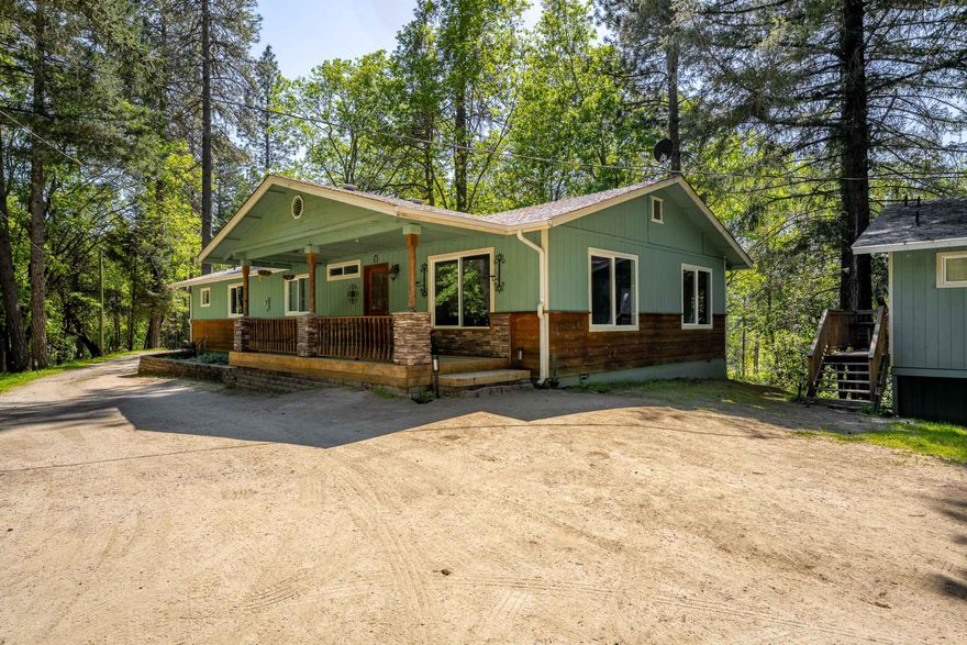 Charming Country Home on 2.78 Acres with Pond & Guest Quarters. Enjoy peace and privacy in this beautifully maintained country home, tucked away in a quiet neighborhood and backed by BLM land. Set on 2.78 acres with mature trees, a creek, and a serene pond, this move-in ready property offers stunning views from the primary bedroom, dining area, and family room. French doors open to a newly stained back deck—perfect for relaxing or entertaining.The main home features 1,680 sq ft, 3 bedrooms, 2 bathrooms, and vinyl windows throughout. Additional living spaces include a 720 sq ft rented guest house (1 bed, 1 bath) and a separate 528 sq ft mother-in-law unit.
Water is plentiful with a private well producing 19 GPM (per seller), plus access to a shared well. Whether you're seeking tranquility, rental income, or multi-generational living, this unique property has it all.
A must-see!