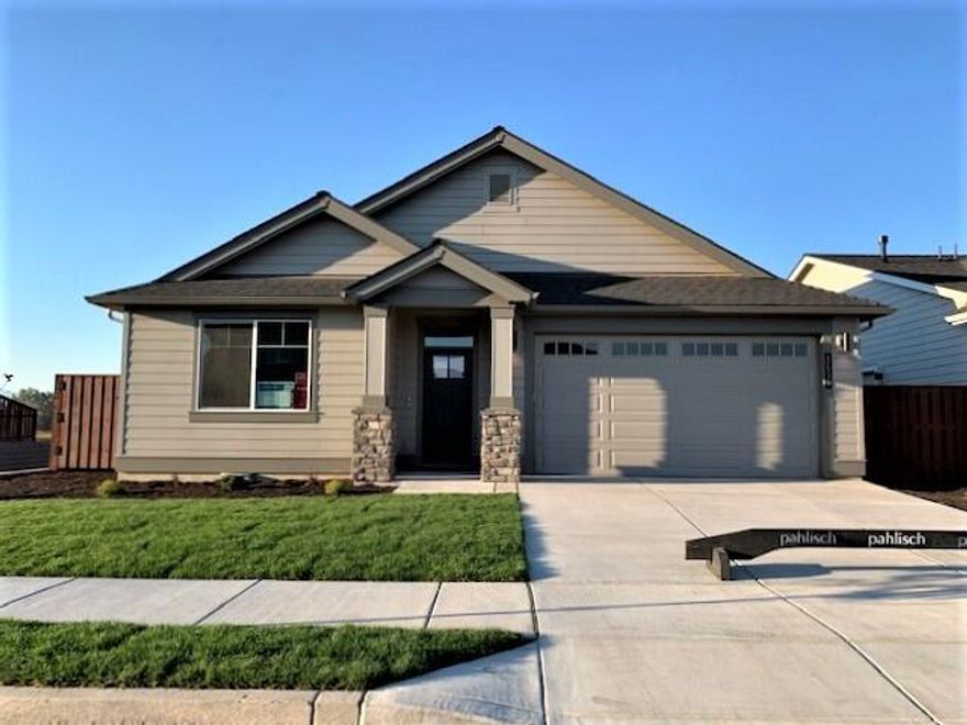 Built exclusively by award-winning Pahlisch Homes: A desirable rim-view lot with a beautiful, new single-level 1,853 SF home of quality finishes, including quartz countertops, under-mount sinks in the kitchen & baths, solid Alder cabinets, laminate plank flooring from the entry through the main living areas, baths, utility room. Features 3 bedrooms, 2 baths, and a pocket den. Open greatroom has a large eating island & gas fireplace, plus a covered back patio & fenced yard. Personalize your interior design package if you purchase early! Upgrades are N/A but this includes a full-height kitchen backsplash & primary suite with tile shower walls. Amazing neighborhood amenities include a swimming pool, parks, play area, sports court, & Ochoco Pointe's community walking path along protected wetland reserve with direct access to acres of public walking trails, going up Barnes Butte & over to Barnes Reservoir. Photos of upgraded similar unit; colors/specifications vary. ITP Offers due 3/13@4pm