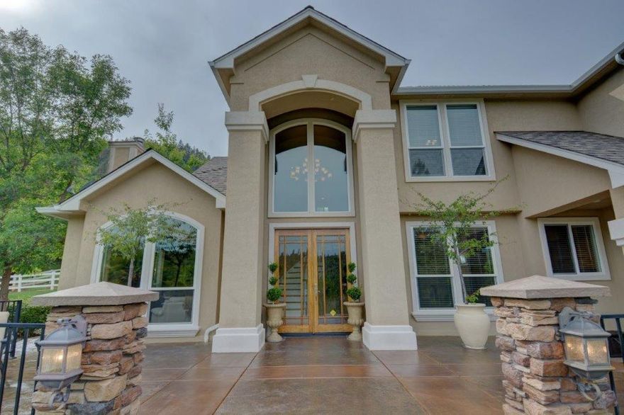 looking for your piece of paradise, well look no further. this lovely stucco home sits on approx. +/-9 acres and is complete with 4 bed/3 bath, formal living room, formal dining room, family room and office and 3 car garage. complete with out door kitchen, approx 42 foot in-ground gunite pool. you don't even have to leave  home to have a restful vacation atmosphere, this home has everything you need to have a stay-vacation. complete with hot tube, out door eatery that will seat at least 20 people and wood fireplace as and gas fireplace. mature landscape and in-ground sprinklers. Horse barn is complete with indoor work shop, as well as impressive tack room and indoor and outdoor horse shower complete with hot water for those cool days.  there is also 5 out door 12x12 paddocks for a total of 10 stall's .the barn has 2 lofts that hold approx. 15 tons of hay. 120x80 arena with lights for night riding, motor home and horse trailer carport. for you gardeners! check out the amazing garden.