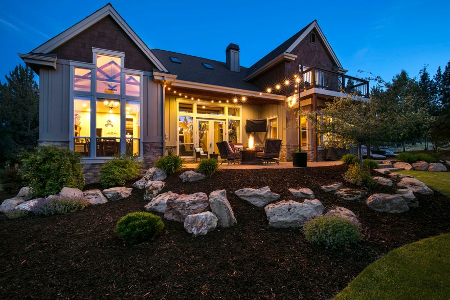 Endless potential & possibilities await - permanent or part-time residence, vacation rental, or corporate retreat in this EXQUISITE home in the award-winning resort at Eagle Crest! Not a single detail was overlooked with every built-in and luxury finishes throughout this large floorplan, with five large bedrooms - all ensuites, perfect for you and your guests to stay and live in ultimate comfort and includes full access to the resort amenities - parks, pools, sports centers, ball courts, walking trails, restaurants, and much more. Special features include: designated workout room with infrared sauna & cork flooring, media/theatre space with wet bar, loft game room/playroom, multi-level laundry hookups, hot tub, pet enclosure, raised garden beds, outdoor play structure, and an exceedingly generous amount of storage throughout the home. You will be left wanting for nothing more - this property truly has it all!