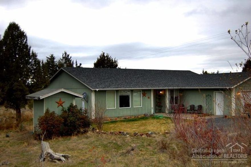 Nicely designed 4 bed, 2 bath, 1920sf home on 1.65 acres. Suitable for animals and plenty of room for a shop & RVs. Single level home with living room and family room with newer blaze king wood stove plus electric heat. Fenced garden area, several fruit trees and storage shed plus complete RV hookup. Enjoy the country living on the nice wooden deck in private backyard.