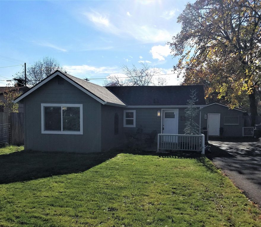 This sparkling home has been almost completely renovated!  Almost everything except the original charm is NEW!  3 Bedrooms; 2 inside main home & 1 in detached auxiliary bldg. 2 BA (1 full & one 1/2) with interior laundry (W/D). 1/2 bath has door to outside, convenient to the auxiliary bldg.  In-ground sprinklers,  large front lawn with established landscape,  &  cozy back yard. New asphalt drive, roofs & so much more; see info sheet on listing.
Seller is offering a full home warranty. Any and all offers to be received by Weds, 11/17 at 8pm;  to be reviewed and responded to Thurs (11/18) by 3pm.