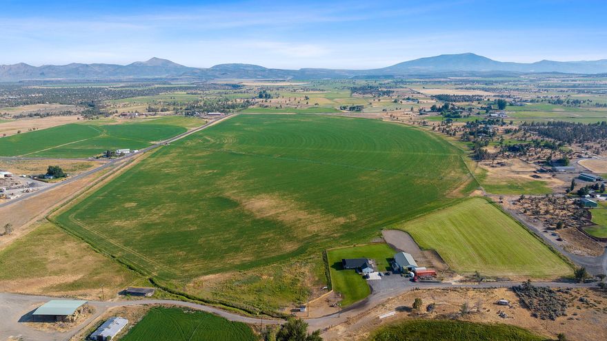 It would be very difficult, if not impossible, to find a better set-up and better producer than Houston Lake Pivot, located in the highly sought after Powell Butte community. This piece of land is 160.4 acres of Powell Butte's best. The land is primarily irrigated from a high production irrigation well (approximately 150± acres), plus an additional 6.5± acres of irrigation through Central Oregon Irrigation District. The seller has completely updated the pivot with a sprinkler package, full remote operation, with monitoring via phone, and has rebuilt the irrigation pump and controls. Best of all, the seller estimates that the hay production is 6.5-7± tons of orchard grass hay per acre over the farming season! In addition, this property has all new perimeter fencing, a brand-new hay shed, and one of the most sought after build sites with spectacular Cascades Mountain views. Located 10 minutes to Prineville & with its exceptional fertility and ideal climate, this property is a rare gem.