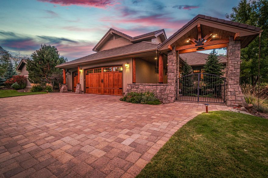 An unparalleled golf and lake setting is combined perfectly with luxury and sophistication in this 3627 sq ft PacWest build home. With mainly main level living two additional bdrm suites upstairs, this floor plan will accommodate a wide range of buyers. With hand distressed hdwd flooring, alder custom cabinetry and built-ins, and vaulted ceiling with exposed trusses, no detail was overlooked in this home. The open concept great room adjoins the dng room and well appointed kitchen, and brings in stellar views of the course and lake from any angle. The kitchen is a chef or entertainer's dream with high end appliances, wet bar, bev fridge and large butler's pantry. The main level has a 4th bdm or office just off the foyer and a primary suite with room for a home gym, office, walk in closet, and spa like bath with built in sauna. Head outside for outdoor living at its finest with a large back patio overlooking the water and enjoy the sunsets or a dip in the hot tub on a cool night.