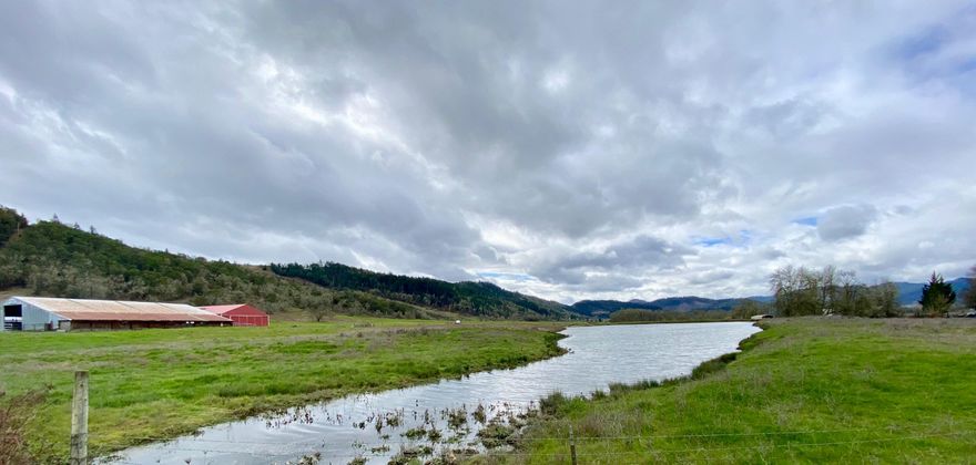128 with 50+ acre Pinot Noir vineyard. High quality infrastructure including pumping & filtration systems for the vineyard. Additional plantable ground for vineyards or other crops. Irrigation ponds, historic 4 bed home, 2 mobile homes, 3 phase power, huge shops, feeder barn, as well as other improvements on 6 tax lots. in the Umpqua Valley AVA. Homes to be viewed upon accepted offer. Also available with additional vineyard estate for combined total of $3.2m, see MLS 220118099. Additional parcel has 142+ acres, 100 acres of irrigation rights, 76 acres planted in Pinot Noir (41 acres in full production and 35 acres of 3 year old vines), home, shops, etc. Grape contracts in place.