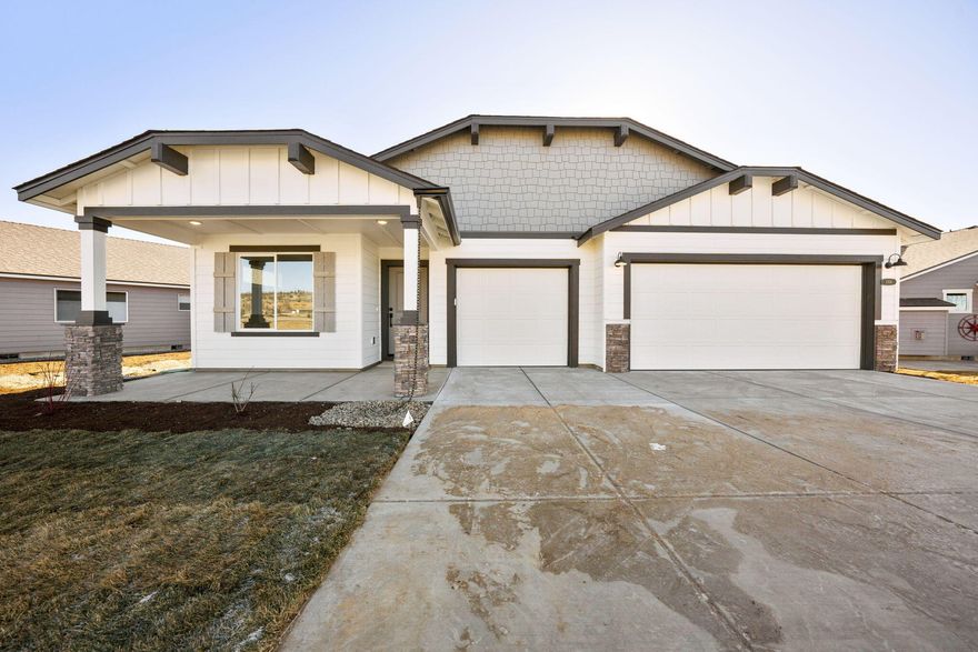 Move in ready! This stunning brand-new home in the desirable Canyon Trails neighborhood offers the perfect blend of contemporary design and comfort. This 1906 SQFT single level home features deluxe chef's kitchen with quartz counters, pantry, island, dishwasher and 5 burner stainless convection built-in gas range. A luxurious primary suite with soaking tub, shower and walk-in closet, great room, three car garage, 95% high efficiency gas forced air heating and gas fireplace. Built by award winning builder MonteVista Homes. **Builder incentive of $10k to use as you choose on builder options, rate buy downs, etc.**
