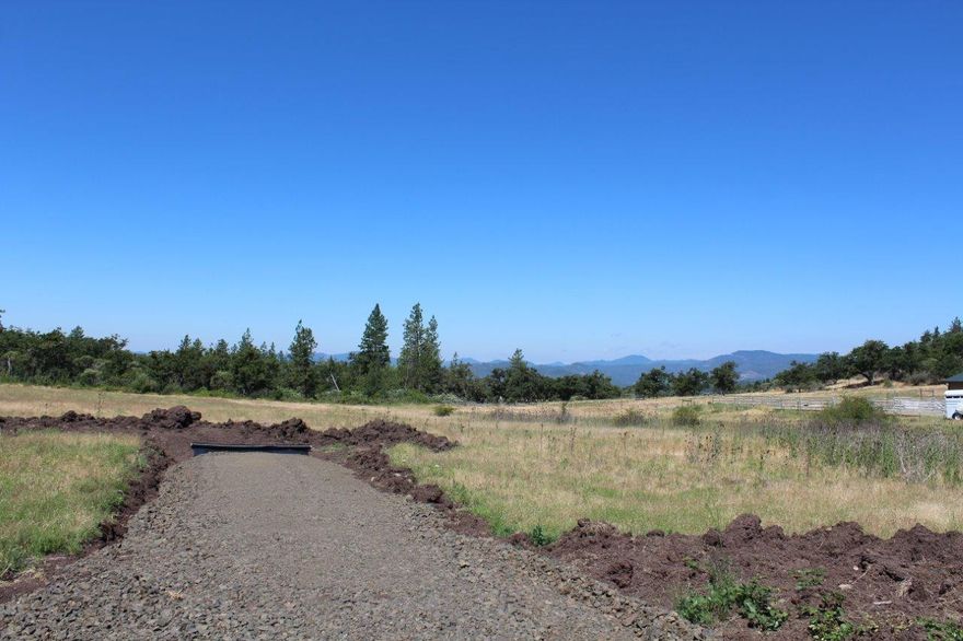 Ready to build 11.5-acres, mostly pasture, homesite approved, good well with new pump, septic installed, rocked driveway to pad, power conduit and vault is to homesite. End of road privacy, area of fine homes, Eagle Point irrigation, zoned EFU. Views of mountains. Butte Falls Highway.