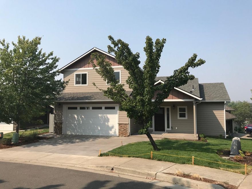 Brand New 3 Bed, 3 Bath 1,829 Sq Ft Home in Desirable NE Grants Pass! This Home offers a Pleasant and Comfortable Floor Plan and a Light and Bright Interior. Enjoy Quality Finish Details such as Granite Counters, Stainless Appliances, and Hickory and Tile Flooring. Several unseen upgrades inclusive of Efficient Lighting, Upgraded Insulation Values, and Soft-Close Cabinetry will make your Living Experience here even more enjoyable! Main-Level Master with Walk-in Closet, Two Large Spare-Bedrooms plus an upstairs Private Deck, and Bonus Room perfect for Office Space, Library, or Family-Room. Two Car Finished Garage, plus plenty of On and Off-Street Parking. Walk-in Understructure Access offers fantastic Additional Storage Space, and Easy Access to Systems of the Home. Quiet Cul-de-Sac of Quality Homes. Lovely Views, and Move-in Ready. Nice Common Area offers a Grassy Park-Like Setting plus a Large Cover for Gatherings. Come see this Fantastic Home and Property in this Desirable Location!