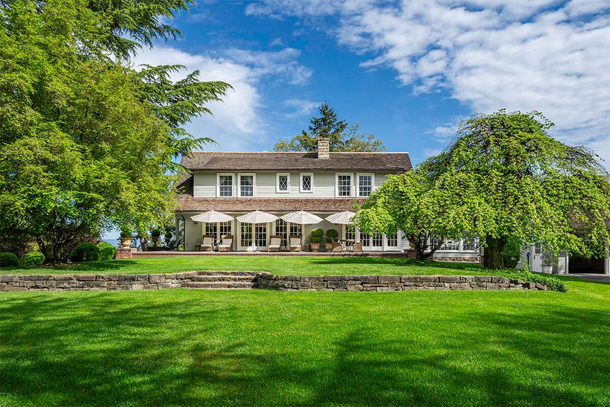 One of a kind, Old East Medford estate nestled on over 2 acres of lush, park-like grounds! An Old English country-style home, its charm timeless. In addition, a 2-car garage, an elegantly appointed 1 bed/1 bath guest house, a newly built pool w/automatic cover & pool house w/living area & full bath. A spacious 3+ car garage & workshop w/convenient alley access, complemented by a beautiful, gated entry & a newly paved circular driveway encircling the entire property. Built in 1910, the house has witnessed more than a century of changing seasons, preserving its timeless elegance & charm. Majestic trees w/wide canopies provide shade for picnics & games, while a charming orchard of apple & pear trees add seasonal beauty. The estate is truly a sanctuary, a perfect blend of history, nature & modern living. Great care was taken to honor the main residence's original character yet all the wiring, plumbing & mechanical systems have been completely replaced & new structural supports added.