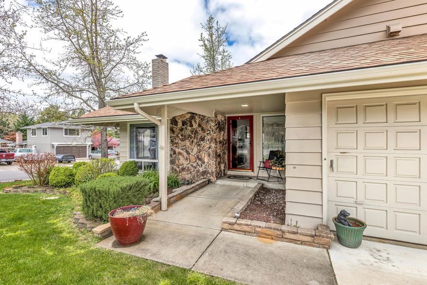 Don't pass up this comfortable spacious home in an established Eastside neighborhood.  This home offers 4 bedrooms, 2 full baths, and almost 2500 square feet.  One bedroom is located on the main level with the kitchen, living room, wood fireplace, and laundry.  The 3 other bedrooms and a bathroom are located upstairs including a large bonus room.  Beautiful new walk-in tile shower and updated bathroom, master bedroom has his/her closets with separate vanity area, the other 2 bedrooms have walk-in closets.  Open kitchen and dining area with custom oak cabinets, double ovens, 10' slider that looks out to the inground pool, and large deck.  3 car garage, RV parking, enclosed outside shed with lots of storage.