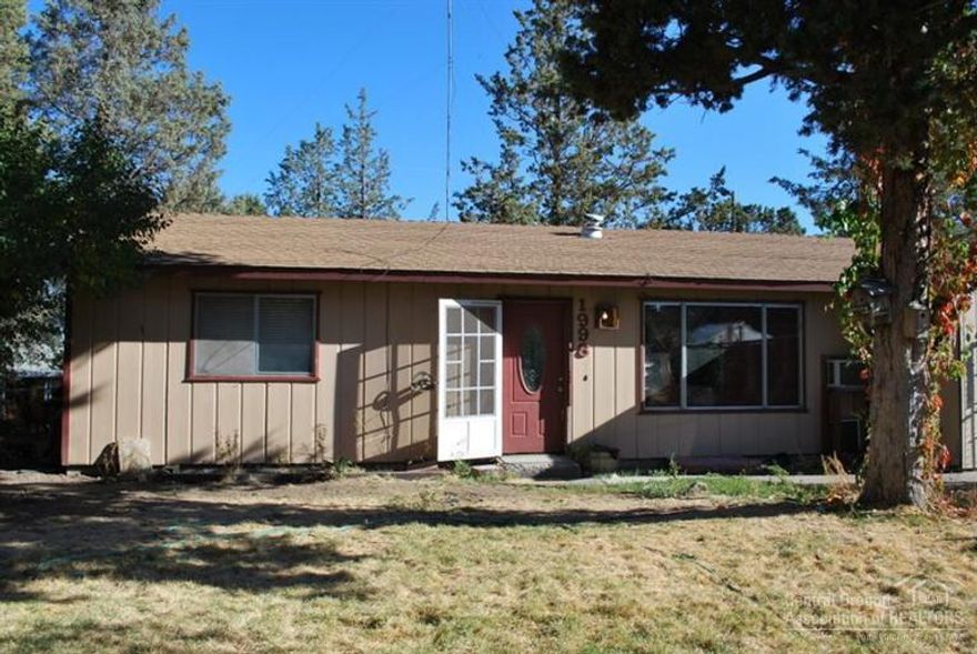 Home is in need of care, great investment potential. Corner lot one block from the river. Single car garage was converted to family room. Oil heater and tank come with the property. Lot is over 1/3 of an acre and with work could be restored, matures trees with landscaping and paver patio, fully fenced.Parking at side of house large enough for boat or camper.